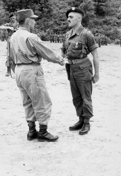 Lt. Genis receiving his award