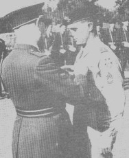 Leiding receiving his Croix de Guerre on his return to Belgium.